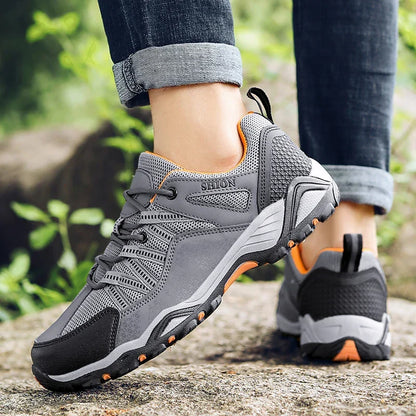 Geländeschritt - Trekking­schuhe